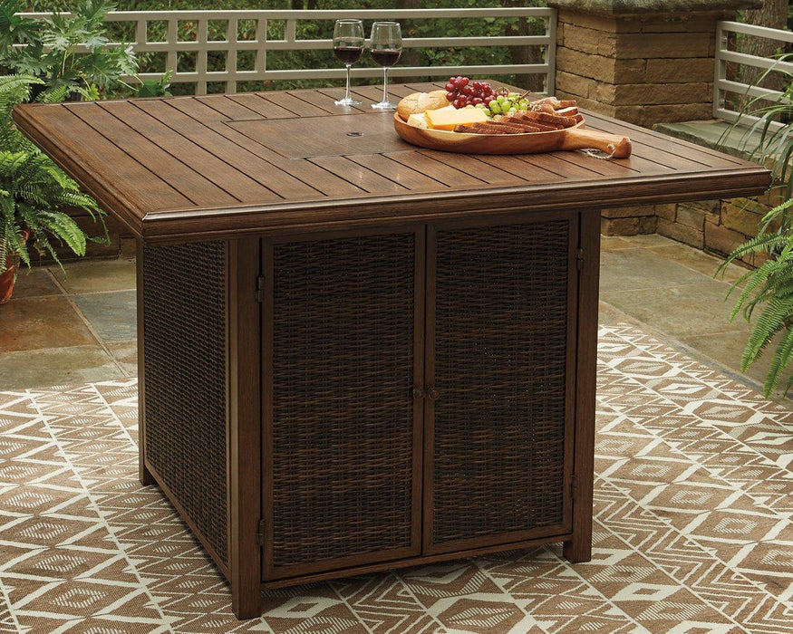 Paradise Trail Bar Table with Fire Pit - Premium Outdoor Pub Table w/FP from Ashley Furniture - Just $1255.98! Shop now at Furniture Wholesale Plus  We are the best furniture store in Nashville, Hendersonville, Goodlettsville, Madison, Antioch, Mount Juliet, Lebanon, Gallatin, Springfield, Murfreesboro, Franklin, Brentwood