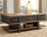 Stanah Coffee Table with Lift Top - Premium Cocktail Table Lift from Ashley Furniture - Just $408.03! Shop now at Furniture Wholesale Plus  We are the best furniture store in Nashville, Hendersonville, Goodlettsville, Madison, Antioch, Mount Juliet, Lebanon, Gallatin, Springfield, Murfreesboro, Franklin, Brentwood