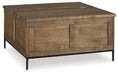 Torlanta Lift-Top Coffee Table - Premium Cocktail Table Lift from Ashley Furniture - Just $370.95! Shop now at Furniture Wholesale Plus  We are the best furniture store in Nashville, Hendersonville, Goodlettsville, Madison, Antioch, Mount Juliet, Lebanon, Gallatin, Springfield, Murfreesboro, Franklin, Brentwood