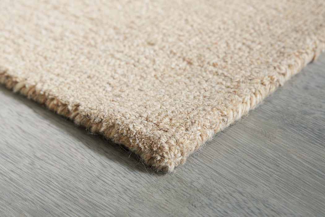 Kencher Rug - Premium Rug Medium from Ashley Furniture - Just $166.28! Shop now at Furniture Wholesale Plus  We are the best furniture store in Nashville, Hendersonville, Goodlettsville, Madison, Antioch, Mount Juliet, Lebanon, Gallatin, Springfield, Murfreesboro, Franklin, Brentwood