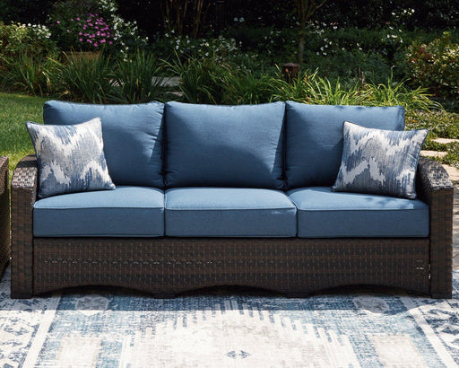 Windglow Outdoor Sofa with Cushion - Premium Outdoor Seating from Ashley Furniture - Just $801.15! Shop now at Furniture Wholesale Plus  We are the best furniture store in Nashville, Hendersonville, Goodlettsville, Madison, Antioch, Mount Juliet, Lebanon, Gallatin, Springfield, Murfreesboro, Franklin, Brentwood