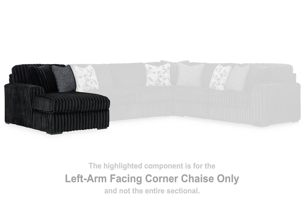 Midnight-Madness Sectional with Chaise - Premium Sectional from Ashley Furniture - Just $1572.08! Shop now at Furniture Wholesale Plus  We are the best furniture store in Nashville, Hendersonville, Goodlettsville, Madison, Antioch, Mount Juliet, Lebanon, Gallatin, Springfield, Murfreesboro, Franklin, Brentwood