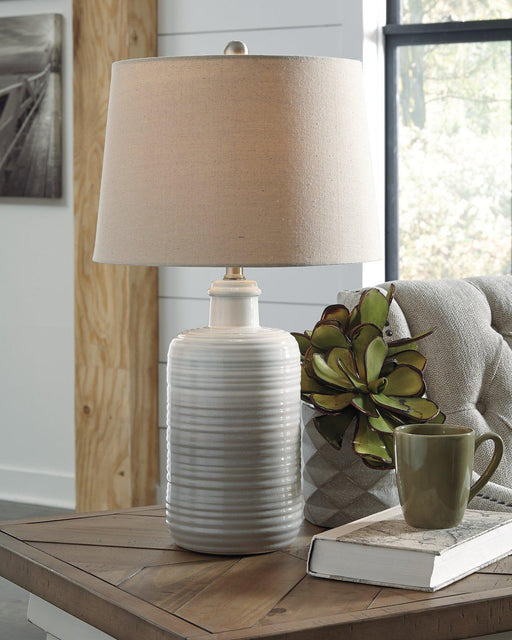 Marnina Table Lamp (Set of 2) - Premium Table Lamp Pair from Ashley Furniture - Just $116.73! Shop now at Furniture Wholesale Plus  We are the best furniture store in Nashville, Hendersonville, Goodlettsville, Madison, Antioch, Mount Juliet, Lebanon, Gallatin, Springfield, Murfreesboro, Franklin, Brentwood