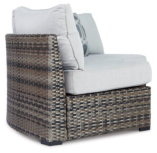 Harbor Court Curved Loveseat with Cushion - Premium Outdoor Seating from Ashley Furniture - Just $733.59! Shop now at Furniture Wholesale Plus  We are the best furniture store in Nashville, Hendersonville, Goodlettsville, Madison, Antioch, Mount Juliet, Lebanon, Gallatin, Springfield, Murfreesboro, Franklin, Brentwood