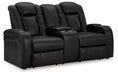 Caveman Den Power Reclining Loveseat with Console - Premium Loveseat from Ashley Furniture - Just $1097.26! Shop now at Furniture Wholesale Plus  We are the best furniture store in Nashville, Hendersonville, Goodlettsville, Madison, Antioch, Mount Juliet, Lebanon, Gallatin, Springfield, Murfreesboro, Franklin, Brentwood