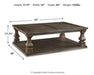 Johnelle Coffee Table - Premium Cocktail Table from Ashley Furniture - Just $408.03! Shop now at Furniture Wholesale Plus  We are the best furniture store in Nashville, Hendersonville, Goodlettsville, Madison, Antioch, Mount Juliet, Lebanon, Gallatin, Springfield, Murfreesboro, Franklin, Brentwood