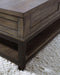 Johurst Coffee Table with Lift Top - Premium Cocktail Table Lift from Ashley Furniture - Just $425.68! Shop now at Furniture Wholesale Plus  We are the best furniture store in Nashville, Hendersonville, Goodlettsville, Madison, Antioch, Mount Juliet, Lebanon, Gallatin, Springfield, Murfreesboro, Franklin, Brentwood