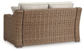 Beachcroft Outdoor Loveseat with Cushion - Premium Outdoor Loveseat from Ashley Furniture - Just $970.15! Shop now at Furniture Wholesale Plus  We are the best furniture store in Nashville, Hendersonville, Goodlettsville, Madison, Antioch, Mount Juliet, Lebanon, Gallatin, Springfield, Murfreesboro, Franklin, Brentwood