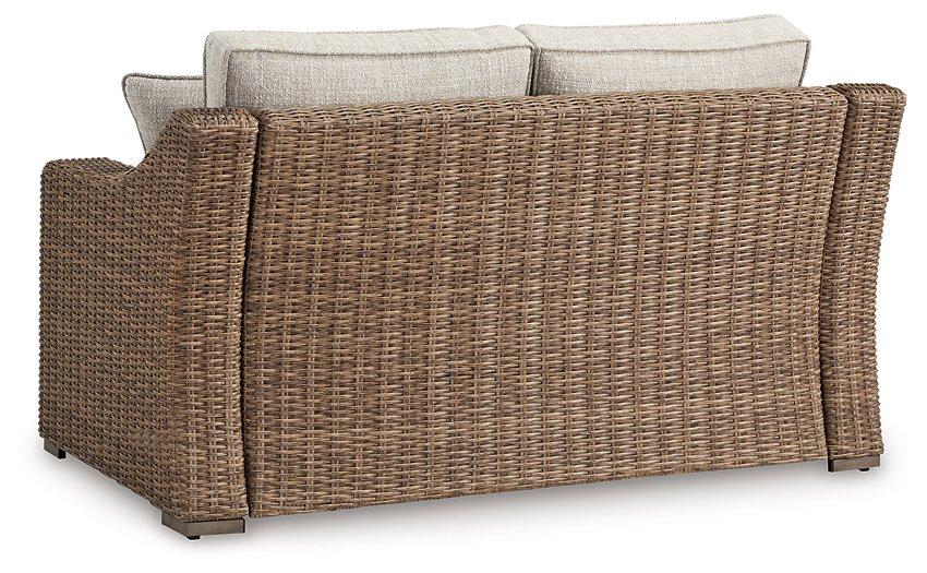 Beachcroft Outdoor Loveseat with Cushion - Premium Outdoor Loveseat from Ashley Furniture - Just $970.15! Shop now at Furniture Wholesale Plus  We are the best furniture store in Nashville, Hendersonville, Goodlettsville, Madison, Antioch, Mount Juliet, Lebanon, Gallatin, Springfield, Murfreesboro, Franklin, Brentwood