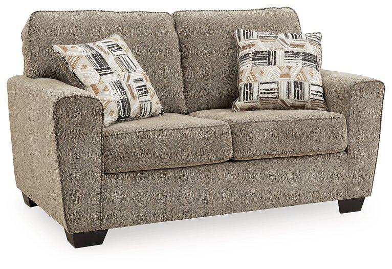 McCluer Loveseat - Premium Loveseat from Ashley Furniture - Just $529.91! Shop now at Furniture Wholesale Plus  We are the best furniture store in Nashville, Hendersonville, Goodlettsville, Madison, Antioch, Mount Juliet, Lebanon, Gallatin, Springfield, Murfreesboro, Franklin, Brentwood