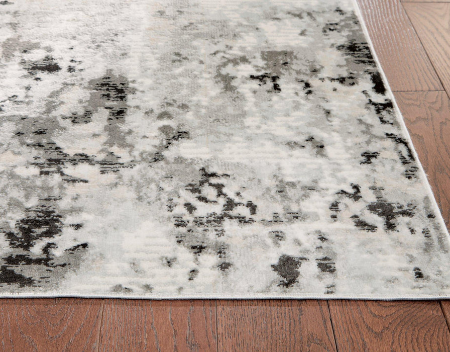 Greyland 5' x 7' Rug - Premium Rug from Ashley Furniture - Just $81.54! Shop now at Furniture Wholesale Plus  We are the best furniture store in Nashville, Hendersonville, Goodlettsville, Madison, Antioch, Mount Juliet, Lebanon, Gallatin, Springfield, Murfreesboro, Franklin, Brentwood