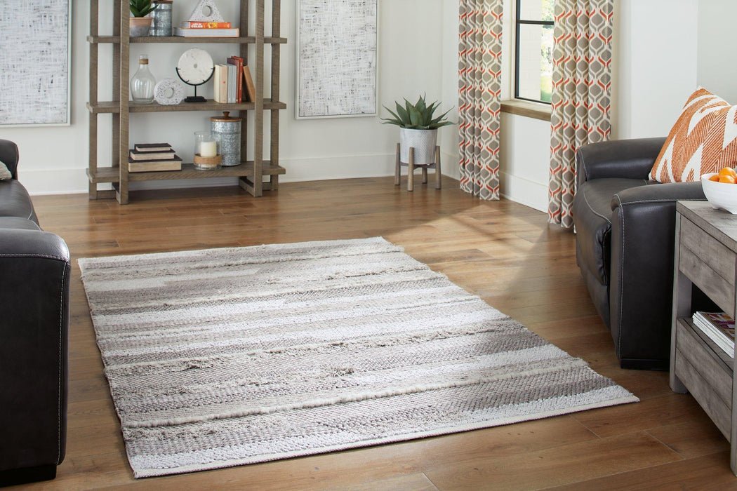 Oranford 5' x 7' Rug - Premium Rug from Ashley Furniture - Just $273.96! Shop now at Furniture Wholesale Plus  We are the best furniture store in Nashville, Hendersonville, Goodlettsville, Madison, Antioch, Mount Juliet, Lebanon, Gallatin, Springfield, Murfreesboro, Franklin, Brentwood