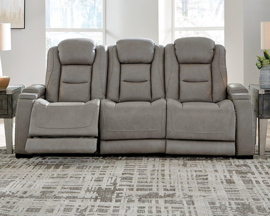 The Man-Den Power Reclining Sofa - Premium Sofa from Ashley Furniture - Just $2183.45! Shop now at Furniture Wholesale Plus  We are the best furniture store in Nashville, Hendersonville, Goodlettsville, Madison, Antioch, Mount Juliet, Lebanon, Gallatin, Springfield, Murfreesboro, Franklin, Brentwood