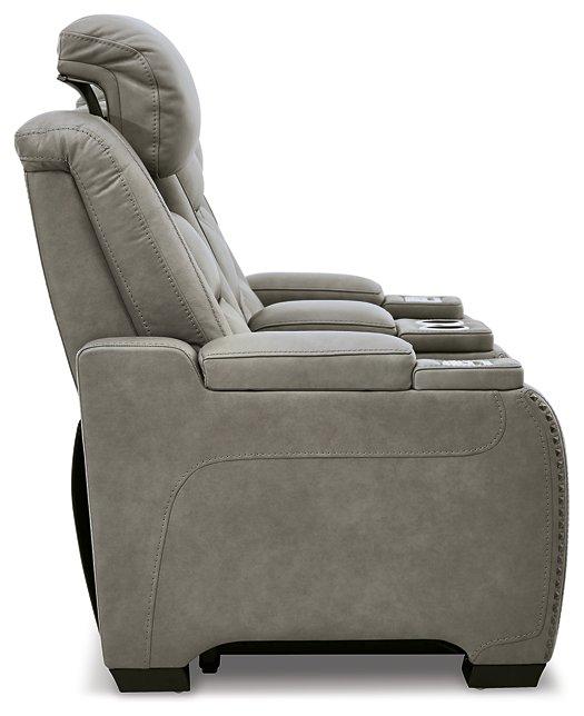 The Man-Den Power Reclining Loveseat with Console - Premium Loveseat from Ashley Furniture - Just $2152.97! Shop now at Furniture Wholesale Plus  We are the best furniture store in Nashville, Hendersonville, Goodlettsville, Madison, Antioch, Mount Juliet, Lebanon, Gallatin, Springfield, Murfreesboro, Franklin, Brentwood