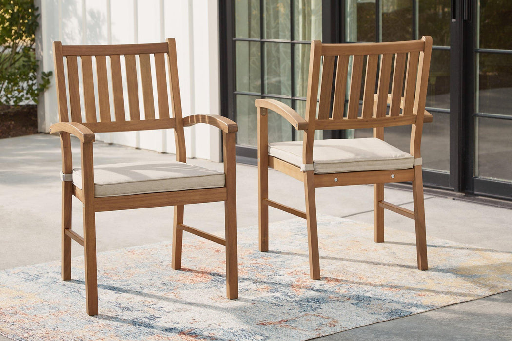 Janiyah Outdoor Dining Arm Chair (Set of 2) - Premium Outdoor Dining Chair from Ashley Furniture - Just $279.55! Shop now at Furniture Wholesale Plus  We are the best furniture store in Nashville, Hendersonville, Goodlettsville, Madison, Antioch, Mount Juliet, Lebanon, Gallatin, Springfield, Murfreesboro, Franklin, Brentwood