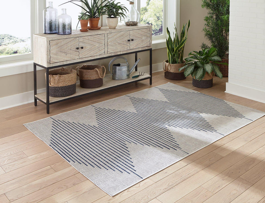 Alverno 7'10" x 10'2" Rug - Premium Rug from Ashley Furniture - Just $149.13! Shop now at Furniture Wholesale Plus  We are the best furniture store in Nashville, Hendersonville, Goodlettsville, Madison, Antioch, Mount Juliet, Lebanon, Gallatin, Springfield, Murfreesboro, Franklin, Brentwood