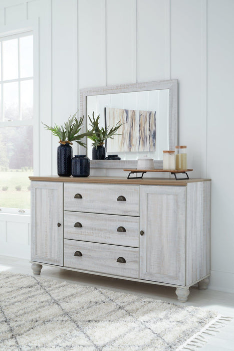 Haven Bay Dresser and Mirror - Premium Dresser & Mirror from Ashley Furniture - Just $538.99! Shop now at Furniture Wholesale Plus  We are the best furniture store in Nashville, Hendersonville, Goodlettsville, Madison, Antioch, Mount Juliet, Lebanon, Gallatin, Springfield, Murfreesboro, Franklin, Brentwood