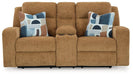 Kanlow Reclining Loveseat with Console - Premium Loveseat from Ashley Furniture - Just $698.28! Shop now at Furniture Wholesale Plus  We are the best furniture store in Nashville, Hendersonville, Goodlettsville, Madison, Antioch, Mount Juliet, Lebanon, Gallatin, Springfield, Murfreesboro, Franklin, Brentwood