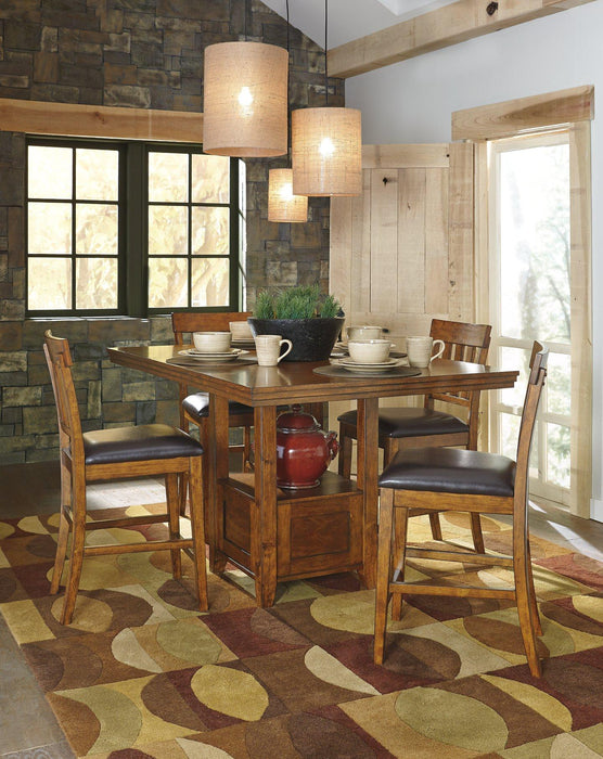 Ralene Counter Height Dining Extension Table - Premium Counter Height Table from Ashley Furniture - Just $372.06! Shop now at Furniture Wholesale Plus  We are the best furniture store in Nashville, Hendersonville, Goodlettsville, Madison, Antioch, Mount Juliet, Lebanon, Gallatin, Springfield, Murfreesboro, Franklin, Brentwood