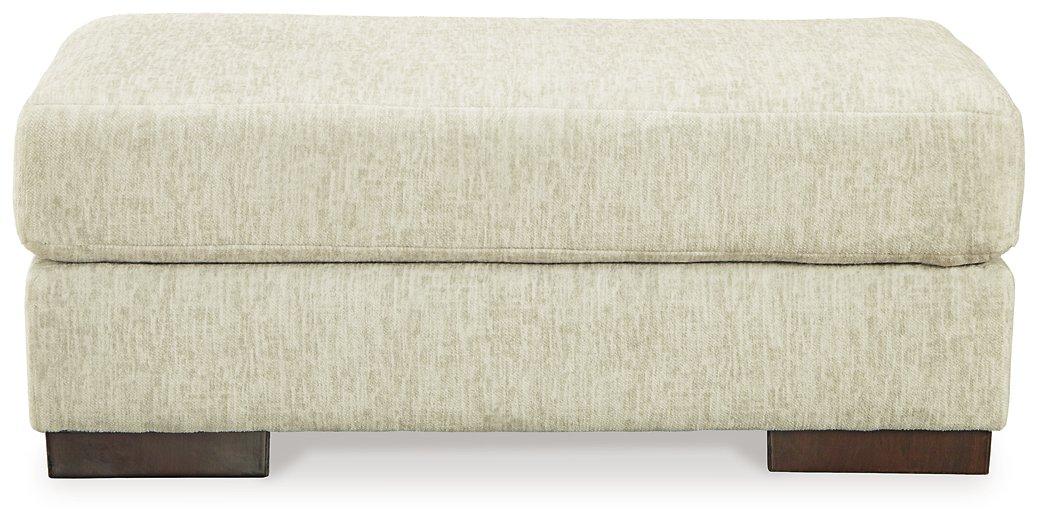 Caretti Ottoman - Premium Ottoman from Ashley Furniture - Just $253.42! Shop now at Furniture Wholesale Plus  We are the best furniture store in Nashville, Hendersonville, Goodlettsville, Madison, Antioch, Mount Juliet, Lebanon, Gallatin, Springfield, Murfreesboro, Franklin, Brentwood