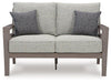 Hillside Barn Outdoor Loveseat with Cushion - Premium Outdoor Seating from Ashley Furniture - Just $1287.92! Shop now at Furniture Wholesale Plus  We are the best furniture store in Nashville, Hendersonville, Goodlettsville, Madison, Antioch, Mount Juliet, Lebanon, Gallatin, Springfield, Murfreesboro, Franklin, Brentwood