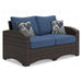 Windglow Outdoor Loveseat with Cushion - Premium Outdoor Seating from Ashley Furniture - Just $560.58! Shop now at Furniture Wholesale Plus  We are the best furniture store in Nashville, Hendersonville, Goodlettsville, Madison, Antioch, Mount Juliet, Lebanon, Gallatin, Springfield, Murfreesboro, Franklin, Brentwood