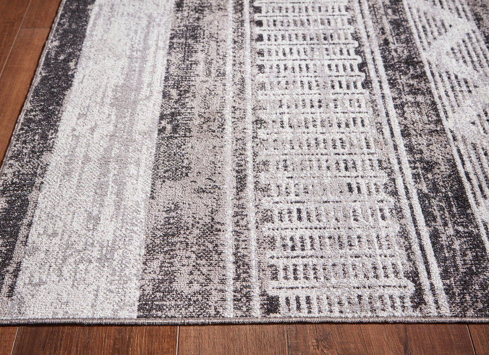 Henchester 8' x 10' Rug - Premium Rug from Ashley Furniture - Just $198.56! Shop now at Furniture Wholesale Plus  We are the best furniture store in Nashville, Hendersonville, Goodlettsville, Madison, Antioch, Mount Juliet, Lebanon, Gallatin, Springfield, Murfreesboro, Franklin, Brentwood