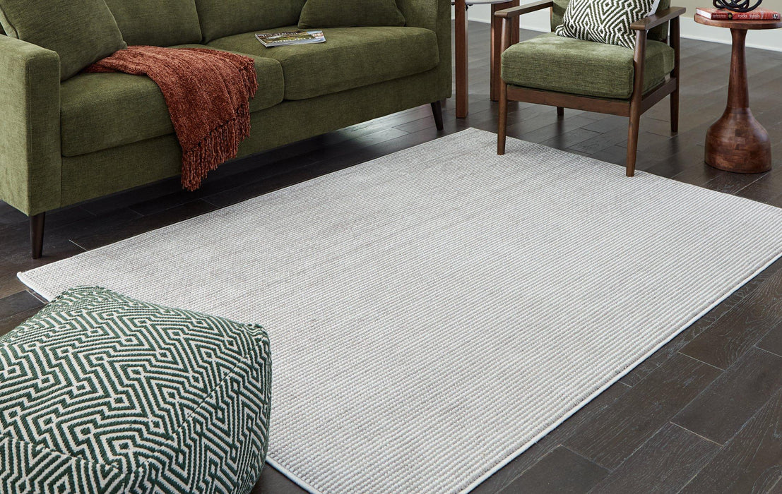 Eduring Medium Rug - Premium Rug Medium from Ashley Furniture - Just $116.84! Shop now at Furniture Wholesale Plus  We are the best furniture store in Nashville, Hendersonville, Goodlettsville, Madison, Antioch, Mount Juliet, Lebanon, Gallatin, Springfield, Murfreesboro, Franklin, Brentwood