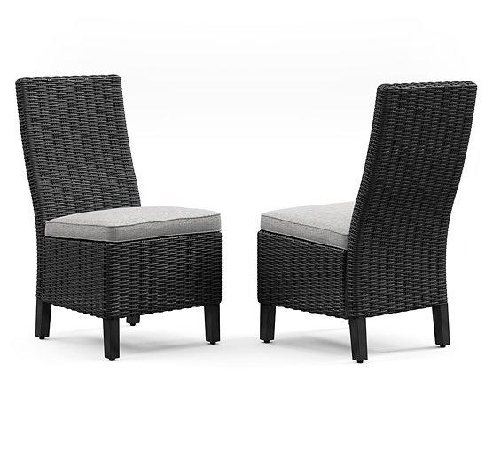 Beachcroft Outdoor Side Chair with Cushion (Set of 2) - Premium Outdoor Dining Chair from Ashley Furniture - Just $624.13! Shop now at Furniture Wholesale Plus  We are the best furniture store in Nashville, Hendersonville, Goodlettsville, Madison, Antioch, Mount Juliet, Lebanon, Gallatin, Springfield, Murfreesboro, Franklin, Brentwood