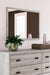 Vessalli Dresser and Mirror - Premium Dresser & Mirror from Ashley Furniture - Just $538.97! Shop now at Furniture Wholesale Plus  We are the best furniture store in Nashville, Hendersonville, Goodlettsville, Madison, Antioch, Mount Juliet, Lebanon, Gallatin, Springfield, Murfreesboro, Franklin, Brentwood