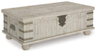 Carynhurst Coffee Table with Lift Top - Premium Cocktail Table Lift from Ashley Furniture - Just $570.44! Shop now at Furniture Wholesale Plus  We are the best furniture store in Nashville, Hendersonville, Goodlettsville, Madison, Antioch, Mount Juliet, Lebanon, Gallatin, Springfield, Murfreesboro, Franklin, Brentwood