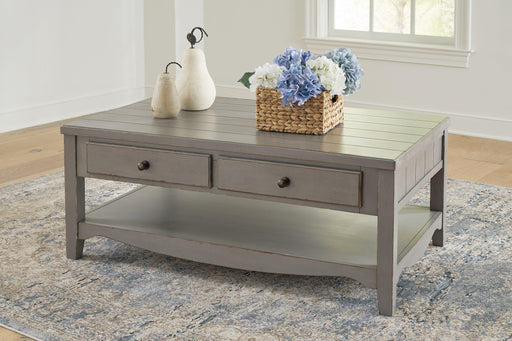 Charina Coffee Table - Premium Cocktail Table from Ashley Furniture - Just $280.92! Shop now at Furniture Wholesale Plus  We are the best furniture store in Nashville, Hendersonville, Goodlettsville, Madison, Antioch, Mount Juliet, Lebanon, Gallatin, Springfield, Murfreesboro, Franklin, Brentwood