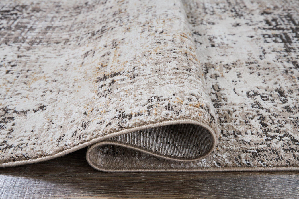 Elaning Medium Rug - Premium Rug Medium from Ashley Furniture - Just $120.37! Shop now at Furniture Wholesale Plus  We are the best furniture store in Nashville, Hendersonville, Goodlettsville, Madison, Antioch, Mount Juliet, Lebanon, Gallatin, Springfield, Murfreesboro, Franklin, Brentwood