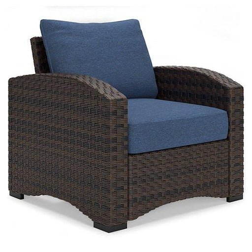 Windglow Outdoor Lounge Chair with Cushion - Premium Outdoor Seating from Ashley Furniture - Just $321.78! Shop now at Furniture Wholesale Plus  We are the best furniture store in Nashville, Hendersonville, Goodlettsville, Madison, Antioch, Mount Juliet, Lebanon, Gallatin, Springfield, Murfreesboro, Franklin, Brentwood