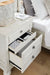 Robbinsdale Nightstand - Premium Nightstand from Ashley Furniture - Just $261.44! Shop now at Furniture Wholesale Plus  We are the best furniture store in Nashville, Hendersonville, Goodlettsville, Madison, Antioch, Mount Juliet, Lebanon, Gallatin, Springfield, Murfreesboro, Franklin, Brentwood