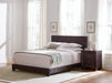 Dorian Brown Faux Leather Upholstered King Bed - Premium Bed from Coaster Z2 Standard - Just $186! Shop now at Furniture Wholesale Plus  We are the best furniture store in Nashville, Hendersonville, Goodlettsville, Madison, Antioch, Mount Juliet, Lebanon, Gallatin, Springfield, Murfreesboro, Franklin, Brentwood