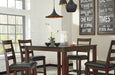 Coviar Counter Height Dining Table and Bar Stools (Set of 5) - Premium Counter Height Table from Ashley Furniture - Just $442.44! Shop now at Furniture Wholesale Plus  We are the best furniture store in Nashville, Hendersonville, Goodlettsville, Madison, Antioch, Mount Juliet, Lebanon, Gallatin, Springfield, Murfreesboro, Franklin, Brentwood