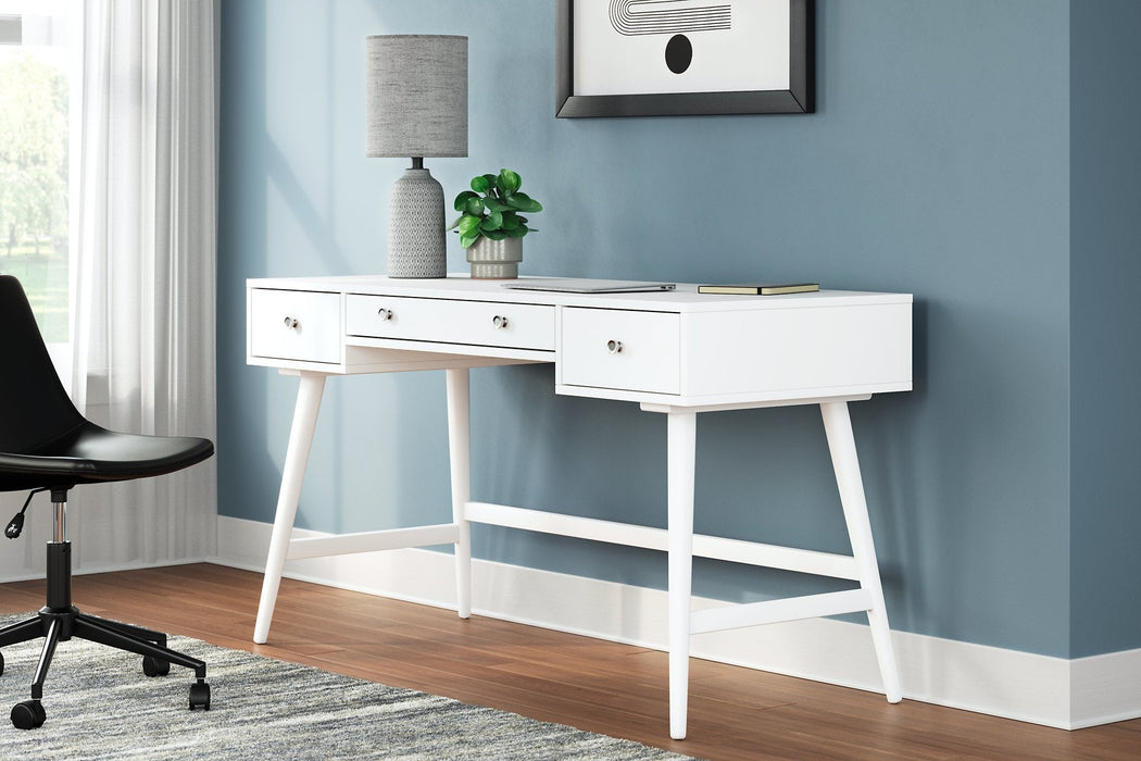 Thadamere 54" Home Office Desk - Premium Desk from Ashley Furniture - Just $237.80! Shop now at Furniture Wholesale Plus  We are the best furniture store in Nashville, Hendersonville, Goodlettsville, Madison, Antioch, Mount Juliet, Lebanon, Gallatin, Springfield, Murfreesboro, Franklin, Brentwood