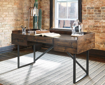Starmore 63" Home Office Desk - Premium Desk from Ashley Furniture - Just $563.11! Shop now at Furniture Wholesale Plus  We are the best furniture store in Nashville, Hendersonville, Goodlettsville, Madison, Antioch, Mount Juliet, Lebanon, Gallatin, Springfield, Murfreesboro, Franklin, Brentwood