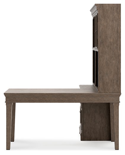Janismore 4-Piece Bookcase Wall Unit with Desk - Premium Desk from Ashley Furniture - Just $1468.10! Shop now at Furniture Wholesale Plus  We are the best furniture store in Nashville, Hendersonville, Goodlettsville, Madison, Antioch, Mount Juliet, Lebanon, Gallatin, Springfield, Murfreesboro, Franklin, Brentwood