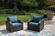 Windglow Outdoor Lounge Chair with Cushion - Premium Outdoor Seating from Ashley Furniture - Just $312.95! Shop now at Furniture Wholesale Plus  We are the best furniture store in Nashville, Hendersonville, Goodlettsville, Madison, Antioch, Mount Juliet, Lebanon, Gallatin, Springfield, Murfreesboro, Franklin, Brentwood