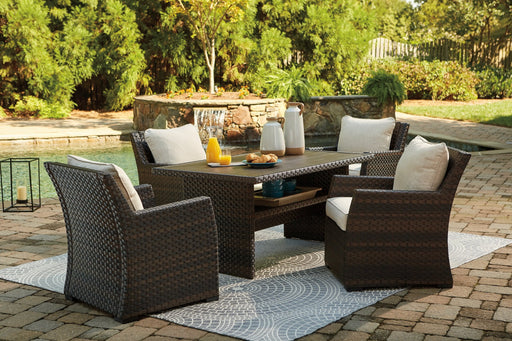 Easy Isle Outdoor Table and 4 Chairs - Premium Outdoor Seating Set from Ashley Furniture - Just $1841.66! Shop now at Furniture Wholesale Plus  We are the best furniture store in Nashville, Hendersonville, Goodlettsville, Madison, Antioch, Mount Juliet, Lebanon, Gallatin, Springfield, Murfreesboro, Franklin, Brentwood