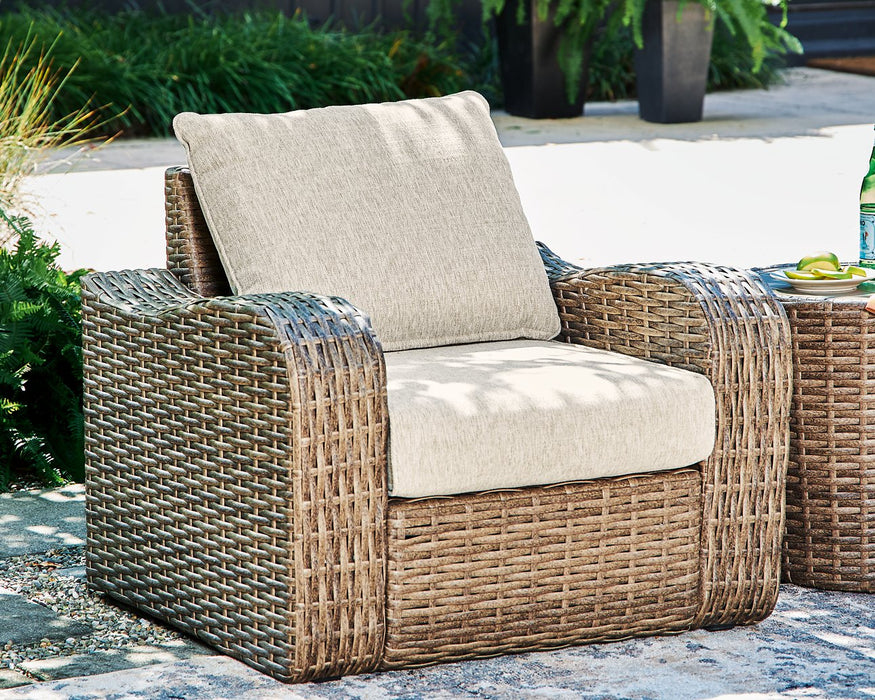 Sandy Bloom Lounge Chair with Cushion - Premium Outdoor Seating from Ashley Furniture - Just $427.70! Shop now at Furniture Wholesale Plus  We are the best furniture store in Nashville, Hendersonville, Goodlettsville, Madison, Antioch, Mount Juliet, Lebanon, Gallatin, Springfield, Murfreesboro, Franklin, Brentwood