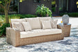 Sandy Bloom Outdoor Sofa with Cushion - Premium Outdoor Seating from Ashley Furniture - Just $1018.29! Shop now at Furniture Wholesale Plus  We are the best furniture store in Nashville, Hendersonville, Goodlettsville, Madison, Antioch, Mount Juliet, Lebanon, Gallatin, Springfield, Murfreesboro, Franklin, Brentwood