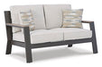 Tropicava Outdoor Loveseat with Cushion - Premium Outdoor Seating from Ashley Furniture - Just $678.86! Shop now at Furniture Wholesale Plus  We are the best furniture store in Nashville, Hendersonville, Goodlettsville, Madison, Antioch, Mount Juliet, Lebanon, Gallatin, Springfield, Murfreesboro, Franklin, Brentwood