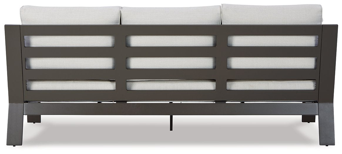 Tropicava Outdoor Sofa with Cushion - Premium Outdoor Seating from Ashley Furniture - Just $885.89! Shop now at Furniture Wholesale Plus  We are the best furniture store in Nashville, Hendersonville, Goodlettsville, Madison, Antioch, Mount Juliet, Lebanon, Gallatin, Springfield, Murfreesboro, Franklin, Brentwood
