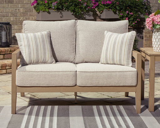 Hallow Creek Outdoor Loveseat with Cushion - Premium Outdoor Seating from Ashley Furniture - Just $1208.48! Shop now at Furniture Wholesale Plus  We are the best furniture store in Nashville, Hendersonville, Goodlettsville, Madison, Antioch, Mount Juliet, Lebanon, Gallatin, Springfield, Murfreesboro, Franklin, Brentwood