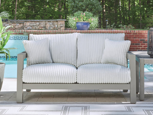 Hurley Park Outdoor Loveseat with Cushion - Premium Outdoor Seating from Ashley Furniture - Just $943.67! Shop now at Furniture Wholesale Plus  We are the best furniture store in Nashville, Hendersonville, Goodlettsville, Madison, Antioch, Mount Juliet, Lebanon, Gallatin, Springfield, Murfreesboro, Franklin, Brentwood