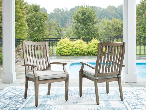 Rainier Ranch Outdoor Arm Chair with Cushion (Set of 2) - Premium Outdoor Dining Chair from Ashley Furniture - Just $623.44! Shop now at Furniture Wholesale Plus  We are the best furniture store in Nashville, Hendersonville, Goodlettsville, Madison, Antioch, Mount Juliet, Lebanon, Gallatin, Springfield, Murfreesboro, Franklin, Brentwood