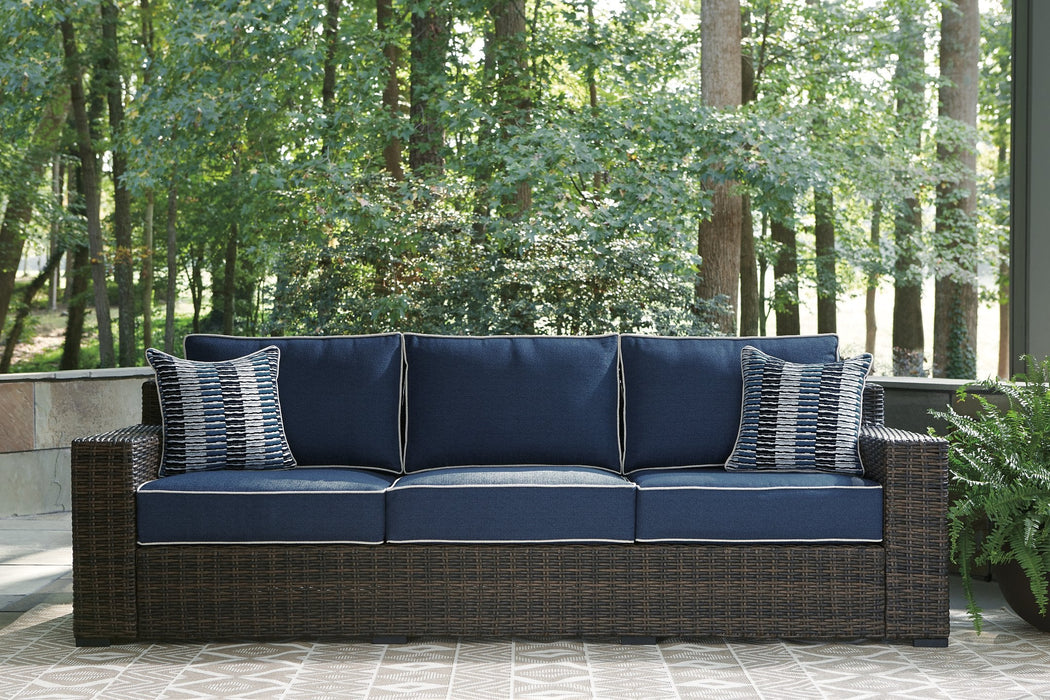 Grasson Lane Outdoor Sofa and Loveseat with Coffee Table - Premium Outdoor Table Set from Ashley Furniture - Just $2322.32! Shop now at Furniture Wholesale Plus  We are the best furniture store in Nashville, Hendersonville, Goodlettsville, Madison, Antioch, Mount Juliet, Lebanon, Gallatin, Springfield, Murfreesboro, Franklin, Brentwood